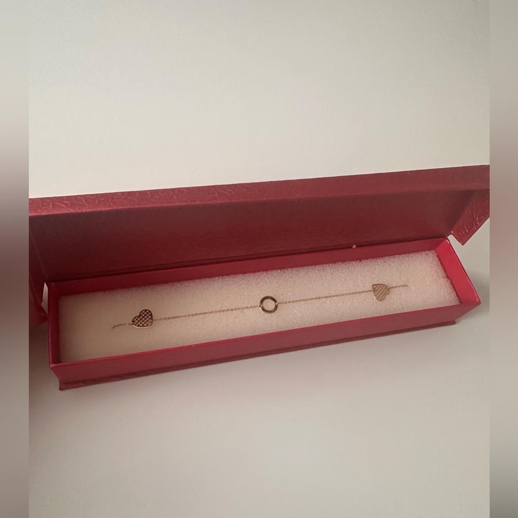 European 14 Karat Gold Necklace With A Circle And Two Hearts